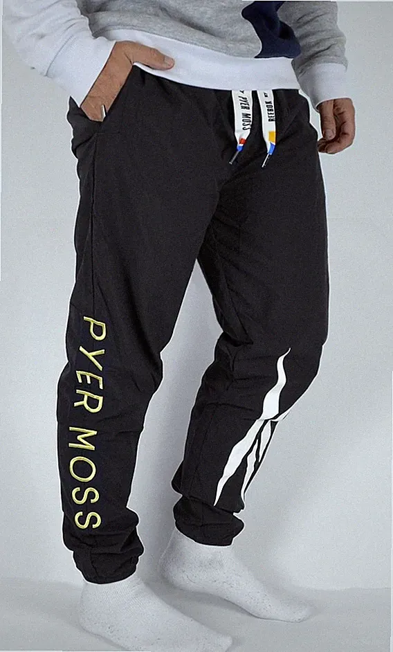 Reebok x Pyer Moss Herren Jogginghose Trainingshose Woven Franchise Hose schwarz