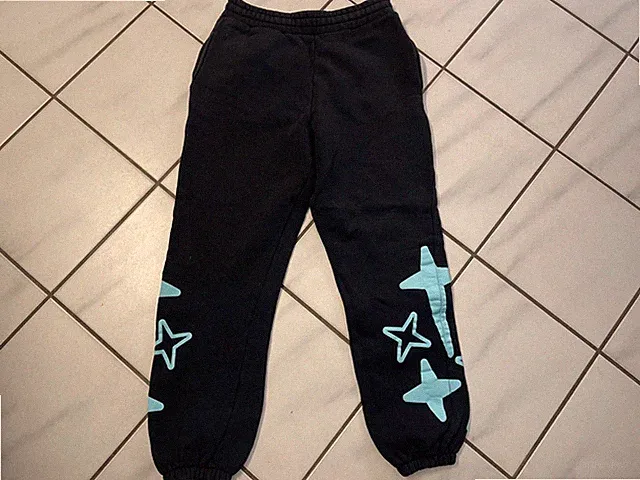 Review Trainingshose Jogginghose Print GR M schwarz