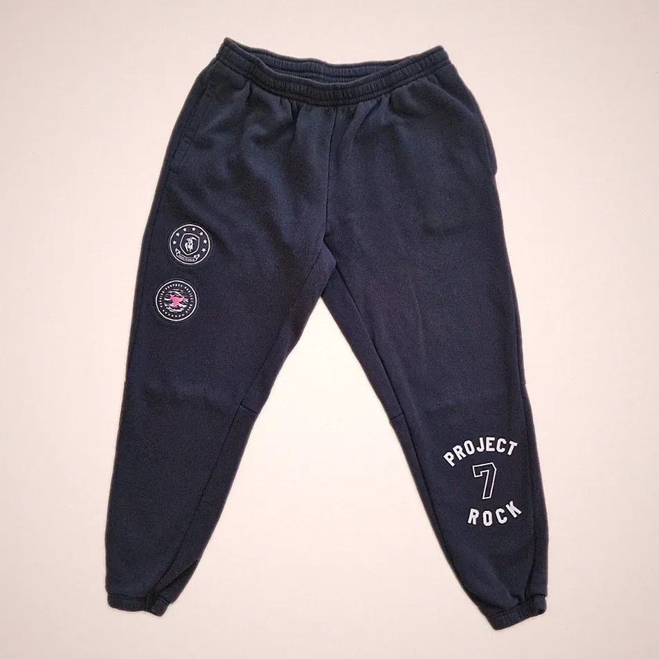Under Armour Project Rock Jogginghose Herren Schwarz Gr. XL / Sweatpants